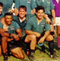 Jason Fox with his arms around Nick Bell and Steve Burnham with Atlantis in 1995. Photo Emil Signes-Atlantis Rugby.