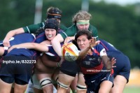 Jossie Tseng sends the ball out during the 2010 Rugby World Cup. Photo Dan Sheridan/INPHO.