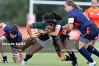 Jossie Tseng makes a tackle during the 2010 Rugby World Cup. Photo Dan Sheridan/INPHO.