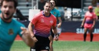 Karl Dickson working at game at NAI 7s. WadeB Photos.