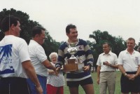 Kevin Swords accepts the Inter-Services Trophy for 1990. Swords played for Air Force.