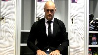 Scott LaValla looking dapper in a suit in the Stade Francais locker room.