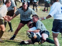 Liz Kirk makes a tackle for the Seattle Rugby Club. Photo courtesy Liz Kirk.