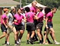 LoCo U18s celebrate the final whistle.