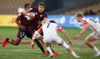 Joe Schroeder navigates some tacklers playing for the USA at the Malaga 7s in Spain. Martin Seras Lima photo.