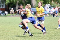 Marian in yellow took it to Iowa Centra CC. Paul DeCoursey photo.