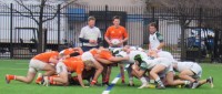 Wolf for Illinois on this side of the scrum (in orange) and Caurdy is in there somewhere. Alex Goff photo.