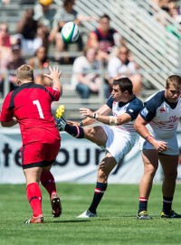 Mike Petri launches a kick against Canada in 2014. David Barpal photo.