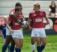 Mike Petri is congratulated for scoring against Russia in 2010 by Pate Tuilevuka and Colin Hawley. Ian Muir photo.