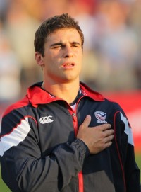 Mike Petri sings the national anthem in Glendale, Numina Photo.