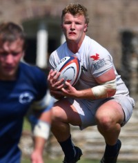 Up in the air for a kick against Penn State this past weekend. David Hughes photo.
