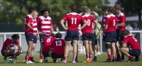 The Lions huddle up, loosely. NA Photo Dubai 7s Photo Service.