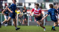 NA Lions in mostly red. Brussels in blue. Photos Emirates Dubai 7s photo service.