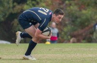 Joey Hobbs looks for options for Navy. Colleen McCloskey photo.