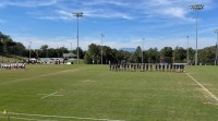 The teams line up before the game. Jim Bell photo.