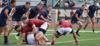 Remy Thomson sends the ball out for Walsh. Alex Goff photo.