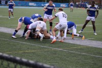 Matheo Lorenzato coming in to secure a ruck for St. Bonaventure. Alex Goff photo.