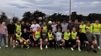 Trying out Gaelic football.