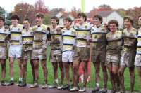 A muddy St. Ignatius team. Alex Goff photo.