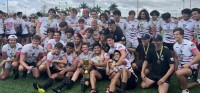 Wanderers all smiles after winning the state final.