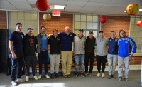 Fitzgerald and Brown meet with UMW players. David Hughes photo.