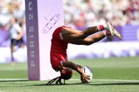 Charity Williams somersaults her way to a try for Canada, who also made the semis. Mike Lee KLC Fotos.