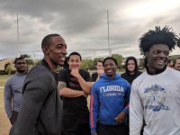 Perry Baker visits the Jacksonville Wolverines HS team.