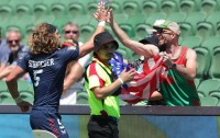 Joe Schroeder seeks out a USA fan after scoring. Mike Lee KLC fotos for World Rugby.