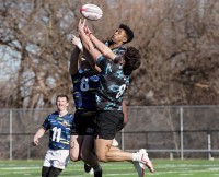Chavez goes up for a kickoff against older players during the Kansas City PR7s ID Trial.