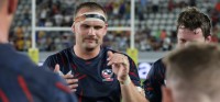 Team huddle time for Sam Golla against Romania. Photo Calder Cahill for USA Rugby.