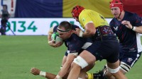 Sam Golla gets tackled against Romania. Calder Cahill USA Rugby photo.