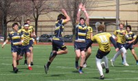 Sean Ward and Isaac Gingerich block a Moeller kick. Alex Goff photo.