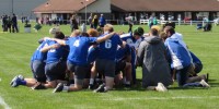 St. Xavier huddles up. Alex Goff photo.