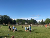 Kids in action at the City of Star touch rugby event.