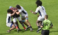Making a tackle. Ollie Laseinde.