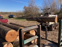 The old goalposts that were telephone poles get cut up.