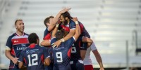 Mike Te'o is congratulated by his teammates after scoring against Russia. David Barpal photo.