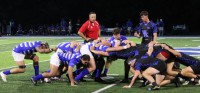 Scrum time. Alex Goff photo.