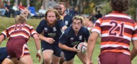 In tight the forwards block out the referee. David Hughes photo.