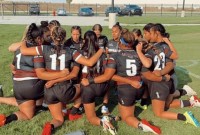 United girls huddle up during a 4-0 day in Salt Lake City.