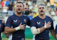 Cam Dolan and Sam Golla belt out the National Anthem. Calder Cahill USA Rugby photo.