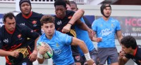 USA U23s in blue vs UXI XV in black. Photo courtesy UXI Sport.
