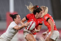 Team GB co-captain Abbie Brown attacks against USA in their medal quarterfinal. Photo: Mike Lee - KLC fotos for World Rugby