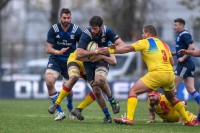 Greg Peterson and Nick Civetta chugging through the mud against Romania in 2018. Ian Muir photo.