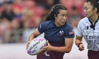Alena Olsen looks for some space. Photo USA Rugby.