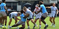 Alev Kelter carries it. David Hughes photo.
