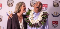 Inductees Julie McCoy and Roy Helu share a joke. Photo Wade Bricknell.