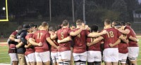 The Walsh team huddles up in the rain. Alex Goff photo.