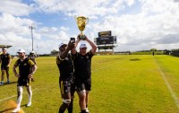 Draper hoists the trophy. Photo courtesy NCR. 