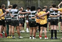 The players huddle up after the game.